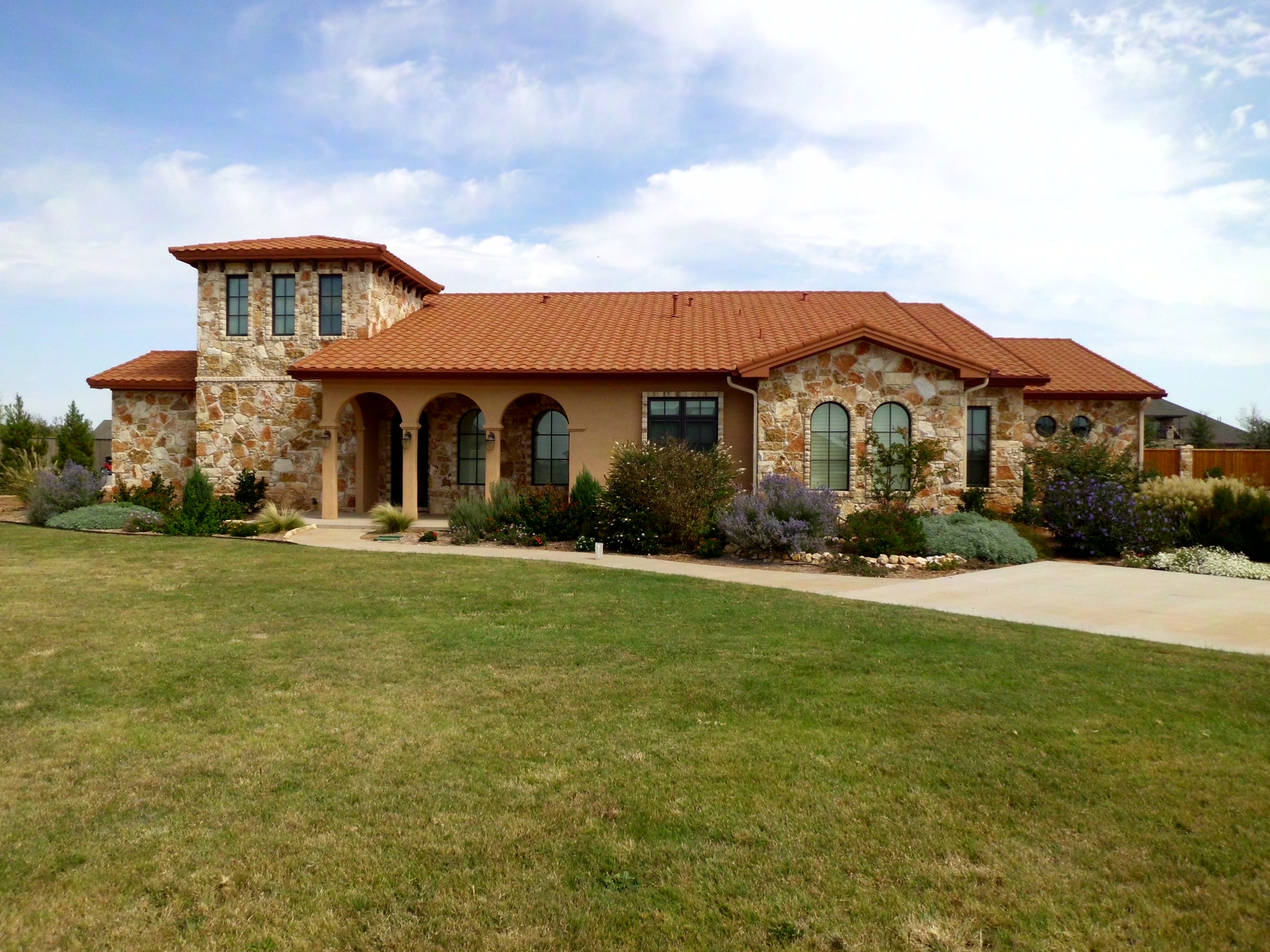 Gerard Barrel Vault Sunset Gold — stone exterior, full view